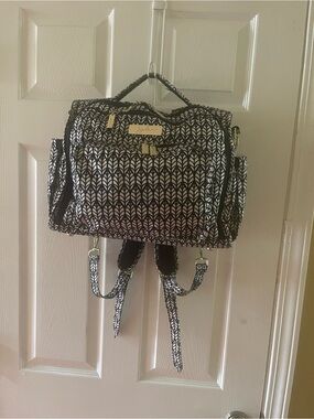 Ju-Ju-Be Black & White Pattern Convertible Baby Backpack with changing pad .